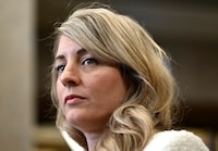 The Canadian government is imposing new sanctions on two Iranians it accuses of participating in the violent repression of women and girls in Iran. Foreign Affairs Minister Mélanie Joly made the announcement Friday to mark International Women's Day. THE CANADIAN PRESS/Justin Tang