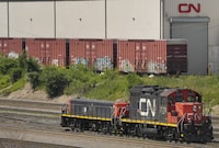 CN rail trains are shown at the CN MacMillan Yard in Vaughan, Ont., on June 20, 2022. THE CANADIAN PRESS/Nathan Denette