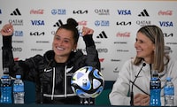 New Zealand's Ali Riley (L) and team's coach Jitka Klimkova attend a press conference at the Eden Park in Auckland on July 19, 2023, ahead of the Women's World Cup football tournament. (Photo by Saeed KHAN / AFP) (Photo by SAEED KHAN/AFP via Getty Images)