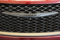 This is the Chrysler logo on the grill of a Chrysler automobile on display at the Pittsburgh International Auto Show in Pittsburgh, Feb. 15, 2024. (AP Photo/Gene J. Puskar)