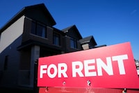 A for rent sign is displayed on a house in Ottawa on Friday, Oct. 14, 2022. A new report says Canada's average asking rent reached a new record in July. THE CANADIAN PRESS/Sean Kilpatrick