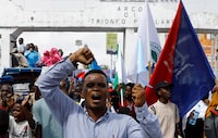 FILE PHOTO: A Somali man reacts during a march against the Ethiopia-Somaliland port deal along KM4 street in Mogadishu, Somalia January 11, 2024. REUTERS/Feisal Omar/File Photo
