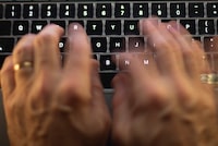 The head of British Columbia's public services says there's high confidence that cybersecurity incidents targetting the provincial government's networks were conducted by a state or state-sponsored actor. A man uses a computer keyboard in Toronto in this Sunday, Oct. 9 photo illustration. THE CANADIAN PRESS/Graeme Roy