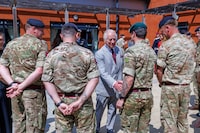 Britain's King Charles visits the 3 Royal School of Military Engineering (RSME), the training base for the Army's Royal Engineers, in Minley, Britain, May 9, 2024.  Jonathan Buckmaster/Pool via REUTERS