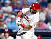 May 7, 2024; Philadelphia, Pennsylvania, USA; Philadelphia Phillies first base Kody Clemens (2) breaks his bat on a ground out in the eighth inning against the Toronto Blue Jays at Citizens Bank Park. Mandatory Credit: Bill Streicher-USA TODAY Sports