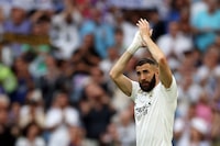 (FILES) Real Madrid's French forward Karim Benzema applauds as he is substituted during the Spanish league football match between Real Madrid CF and Athletic Club Bilbao at the Santiago Bernabeu stadium in Madrid on June 4, 2023. Real Madrid's Ballon d'Or winner Karim Benzema has signed to join Saudi Arabia's Al-Ittihad for three years starting next season, a source in the Jeddah-based club told AFP on June 6. (Photo by Pierre-Philippe MARCOU / AFP) (Photo by PIERRE-PHILIPPE MARCOU/AFP via Getty Images)