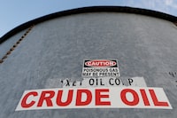 A sticker reads crude oil on the side of a storage tank in the Permian Basin in Mentone, Loving County, Texas, U.S. November 22, 2019. REUTERS/Angus Mordant/File Photo