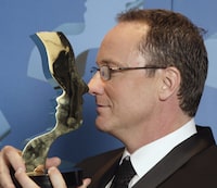 Former “W5” host Kevin Newman says the demise of Canada's longstanding prime-time investigative program is “depressing” and worries about the future of hard-hitting journalism in the country. Newman takes a closer look at his Gemini award after winning it for Best News Anchor at the 20th annual Gemini Awards in Toronto on Saturday November 19, 2005. THE CANADIAN PRESS/CP-Frank Gunn