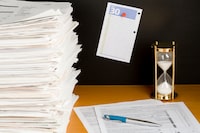 File #: 5196878  Exclusive iStockphoto Photographer 
Tax Time in Canada
Desk with lots of paper, Canadian federal tax form and a page from calendar with the last date to file tax return.
Credit:  Ireneusz Skorupa /   iStockphoto

(Royalty-Free)