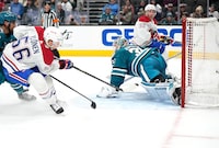 SAN JOSE, CALIFORNIA - FEBRUARY 28: Jesse Ylonen #56 of the Montreal Canadiens scores a goal against goalie Kaapo Kahkonen #36 of the San Jose Sharks during the third perio at SAP Center on February 28, 2023 in San Jose, California. (Photo by Thearon W. Henderson/Getty Images)