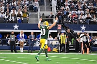 Green Bay Packers quarterback Jordan Love (10) reacts after throwing a touch down against the Dallas Cowboys of an NFL wild-card playoff football game Sunday, Jan 14, 2024, Texas, in Arlington. (AP Photo/Maria Lysaker)