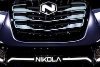FILE PHOTO: U.S. Nikola's logo is pictured at an event held to present CNH's new full-electric and Hydrogen fuel-cell battery trucks in partnership with U.S. Nikola event in Turin, Italy, December 3, 2019. REUTERS/Massimo Pinca/File Photo