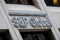 FILE PHOTO: The S&P Global logo is displayed on its offices in the financial district in New York City, U.S., December 13, 2018. REUTERS/Brendan McDermid/File Photo