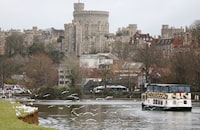 FILE PHOTO: A leisure cruiser is seen on the River Thames near Windsor Castle, in Eton, Britain, January 26, 2023.  REUTERS/Peter Nicholls/File Photo