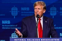 FILE PHOTO: Former U.S. President and Republican presidential candidate Donald Trump addresses the 2024 National Religious Broadcasters Association International Christian Media Convention, as part of the NRB Presidential Forum in Nashville, Tennessee, U.S., February 22, 2024.  REUTERS/Seth Herald/File Photo