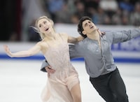 Piper Gilles and Paul Poirier of Canada perform their free dance in the ice dance competition at the 2024 ISU World Figure Skating Championships in Montreal, Saturday, March 23, 2024. THE CANADIAN PRESS/Christinne Muschi