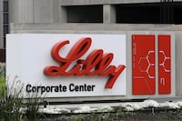 FILE - A sign for Eli Lilly & Co. stands outside their corporate headquarters in Indianapolis on April 26, 2017. A new study finds that the medicine in the diabetes drug Mounjaro helped people with obesity or who are overweight lose at least a quarter of their body weight. (AP Photo/Darron Cummings, File)