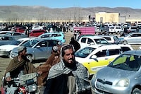 This screen grab from a video taken on January 22, 2024, shows Afghan men leaving a football stadium after attending the public execution by Taliban authorities of two men convicted of murder, in Ghazni. Both men were executed by multiple gunshots to the back in Ghazni city after Supreme Court official Atiqullah Darwish read aloud a death warrant signed by Taliban Supreme Leader Hibatullah Akhundzada. (Photo by AFP) (Photo by -/AFP via Getty Images)