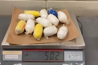 Police in Mission, B.C., say they are seeking the owner of half a kilogram of cocaine that was hidden in a public restroom's ceiling and anyone who wants to claim the drugs should bring "proof of purchase." THE CANADIAN PRESS/HO-RCMP, *MANDATORY CREDIT*