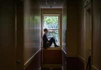 Kathrin Mentler, 37, is photographed at her Vancouver apartment building on July 27, 2023. 
(Jennifer Gauthier/The Globe and Mail)


