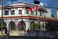 View of Canada's Embassy in Havana, on November 30, 2021. - A group of 18 Canadian diplomats are suing their government on the grounds that they begun to suffer headaches, visual disturbances and nausea, after being stationed in Cuba. Officially, Ottawa authorities recognize 14 cases, the last of them reported in December 2018, though in total there would be around thirty, according to the plaintiffs. (Photo by YAMIL LAGE / AFP) (Photo by YAMIL LAGE/AFP via Getty Images)