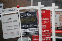 As home prices rise, a group of Toronto realtors say governments should focus economic recovery plans on housing supply -- and be careful of stoking too much demand. Real estate for sale signs are shown in Oakville, Ont. on December 1, 2018. THE CANADIAN PRESS/Richard Buchan