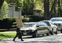 Toronto police are seeking help from the public as they continue to investigate a shooting that seriously injured a security guard outside rapper Drake's mansion. Toronto Police investigate a crime scene outside the mansion of Canadian rap mogul Drake in Toronto's Bridle Path neighbourhood, Tuesday, May 7, 2024. THE CANADIAN PRESS/Nathan Denette