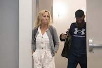 Carrie Low, left, arrives to provide her testimony at a Police Review Board hearing in Halifax on Monday, July 10, 2023. THE CANADIAN PRESS/Darren Calabrese