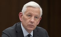 Dominic Barton waits to appear as a witness at the Standing Committee on Government Operations and Estimates, Wednesday, February 1, 2023 in Ottawa. The committee is looking into consulting contracts awarded to McKinsey & Company. THE CANADIAN PRESS/Adrian Wyld