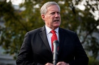 FILE PHOTO: White House Chief of Staff Mark Meadows speaks to reporters following a television interview, outside the White House in Washington, U.S. October 21, 2020. REUTERS/Al Drago/File Photo