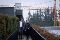 B.C. Premier David Eby, left, and Prime Minister Justin Trudeau walk at an apartment complex during a news conference in Vancouver, B.C., Tuesday, Feb. 20, 2024. THE CANADIAN PRESS/Ethan Cairns 
