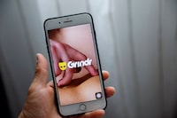 Grindr app is seen on a mobile phone in this photo illustration taken in Shanghai, China March 28, 2019. REUTERS/Aly Song/Illustration