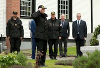 Princess Anne salutes after laying a commemorative wreath following a tour at the God's Acre cemetery at Esquimalt, B.C., on Saturday, May 4, 2024. THE CANADIAN PRESS/Chad Hipolito  