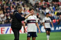 Mar 30, 2024; Vancouver, British Columbia, CAN; Vancouver Whitecaps FC head coach Vanni Sartini instructs midfielder Alessandro Schopf (8) during the second half against the Portland Timbers at BC Place. Mandatory Credit: Simon Fearn-USA TODAY Sports