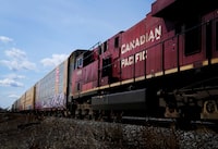 Canadian Pacific Railway Ltd. says it has reached a tentative agreement with the union representing about 550 administrative support and intermodal employees in Canada. Canadian Pacific Railway trains sit at the main CP Rail train yard in Toronto on Monday, March 21, 2022. THE CANADIAN PRESS/Nathan Denette