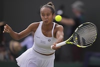 Canada's Leylah Fernandez returns to Caroline Garcia of France in a women's singles match on day four of the Wimbledon tennis championships in London, Thursday, July 6, 2023. (AP Photo/Alberto Pezzali)