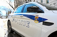 <p>A Quebec City police patrol car in Quebec City on Tuesday, March 12, 2024. The Crown says two people have been charged in the killing of a 14-month old girl last month at a home daycare in Quebec City. THE CANADIAN PRESS/Jacques Boissinot</p>