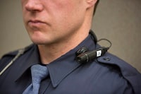 A minor soccer association in Quebec is planning to equip referees with body cameras next season. In a Friday, March 6, 2015, photo, a body cam is shown by a Grand Rapids police officer during a media event at the Grand Rapids Police Department Headquarters in Grand Rapids, Mich. THE CANADIAN PRESS/AP-The Grand Rapids Press, Hugh Carey; ALL LOCAL TELEVISION OUT; LOCAL TELEVISION INTERNET OUT