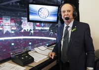 Legendary broadcaster Bob Cole poses prior to calling his last NHL hockey game between the Montreal Canadiens and the Toronto Maple Leafs in Montreal, Saturday, April 6, 2019. Broadcaster Cole, a welcome voice for Canadian hockey fans for a half-century, has died at the age of 90. THE CANADIAN PRESS/Graham Hughes