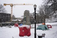 Halifax Regional Fire and Emergency Services says a fire broke out in a tent at an encampment in the downtown’s Grand Parade over the weekend. Red ice fishing enclosures are pictured at a tent encampment in downtown Halifax, Monday, Dec. 4, 2023. THE CANADIAN PRESS/Darren Calabrese