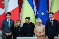Ukraine's President Volodymyr Zelenskiy, European Commission President Ursula von der Leyen, Belgium's Prime Minister Alexander De Croo, Italy's Prime Minister Giorgia Meloni and Canada's Prime Minister Justin Trudeau pose for a photo after a joint press conference, on the second anniversary of the Russian invasion of Ukraine, in Kyiv, Ukraine February 24, 2024. REUTERS/Alina Smutko