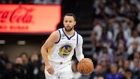 Golden State Warriors guard Stephen Curry (30) brings the ball up court during the second half of Game 7 of an NBA basketball first-round playoff series Sunday, April 30, 2023, in Sacramento, Calif. The Warriors won 120-100. (AP Photo/José Luis Villegas)