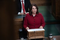 Newfoundland and Labrador is projecting a deficit of $154 million for the current fiscal year. Siobhan Coady, deputy premier and minister of finance for Newfoundland and Labrador, delivers her 2023 budget in the House of Assembly, in St John's, Thursday, March 23, 2023. THE CANADIAN PRESS/Paul Daly