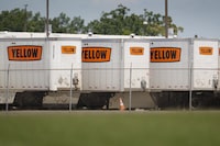 <div>Unifor says nearly 130 Canadian truck drivers were told not to report for work after the Teamsters Union said U.S. trucking giant Yellow Corp. shut down operations and filed for bankruptcy. Box trailers are seen at Yellow Corp. trucking facility in Nashville, Tenn., Monday, July 31, 2023. THE CANADIAN PRESS/AP-George Walker IV</div>