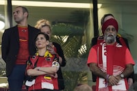 Canada's Minister of International Development Harjit Sajjan, right, looks on as Belgium Foreign Minister Hadja Lahbib, wears a "One Love" armband on the tribune during the World Cup group F soccer match between Belgium and Canada, at the Ahmad Bin Ali Stadium in Doha, Qatar, Wednesday, Nov. 23, 2022. Sajjan is facing opposition criticism after not making any public statement about human rights during his visit to Qatar. THE CANADIAN PRESS/AP-Natacha Pisarenko