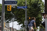 <div>Three former Toronto mayors are asking the city to reconsider its decision to rename Dundas Street, in a letter where they question the practicality of the move and the research supporting it. A cyclist turns at an intersection on Dundas Street West, in Toronto, Wednesday, June 10, 2020. THE CANADIAN PRESS/Giordano Ciampini</div>