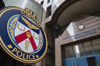 The Toronto Police Services emblem is photographed during a press conference at TPS headquarters, in Toronto on Tuesday, May 17, 2022.&nbsp;<i data-stringify-type="italic" style="box-sizing: inherit; color: rgb(29, 28, 29); font-family: Slack-Lato, Slack-Fractions, appleLogo, sans-serif; font-size: 15px; font-variant-ligatures: common-ligatures; orphans: 2; widows: 2; background-color: rgb(248, 248, 248); text-decoration-thickness: initial;">Police say a lengthy, cross-border firearms trafficking investigation initiated by Toronto police has led to the arrests of 42 people and the seizure of 173 guns in Canada and the U.S. THE</i>&nbsp;CANADIAN PRESS/Christopher Katsarov