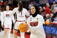 North Carolina State's Jannah Eissa warms up prior to a second-round college basketball game against Tennessee in the NCAA Tournament in Raleigh, N.C., Monday, March 25, 2024. (AP Photo/Ben McKeown)