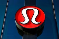 FILE PHOTO: A Lululemon Athletica logo is seen outside one of the company's stores in New York, December 16, 2013.  REUTERS/Shannon Stapleton  (UNITED STATES - Tags: BUSINESS FASHION TEXTILE LOGO)/File Photo