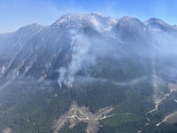 The Spetch Creek wildfire burns near Pemberton, B.C. in this recent handout photo. The BC Wildfire Service says crews are responding to two "highly visible" out of control wildfires in the Pemberton, B.C., area. It says both will likely remain visible throughout the weekend due to forecasted windy conditions. THE CANADIAN PRESS/HO, BC Wildfire Service *MANDATORY CREDIT*